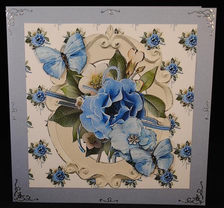 Pretty Blue Flowers and Butterflies 8x8 by Yvonne Middleton