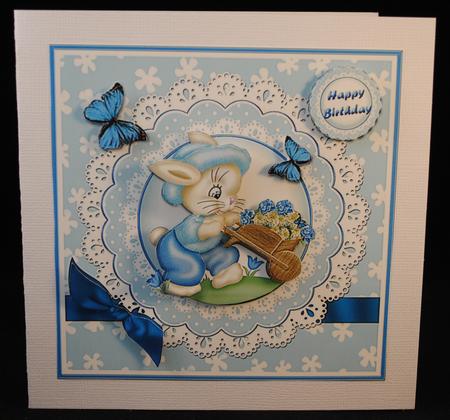 Bunny and Wheelbarrow Square Card Front by Yvonne Middleton