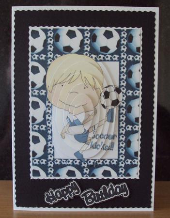 Little Boy in Blue Playing Football, Oval Pyramids by Zeta Pearce