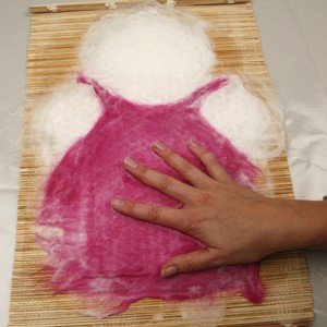 Wet felted hand doll