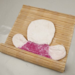 Wet felted hand doll