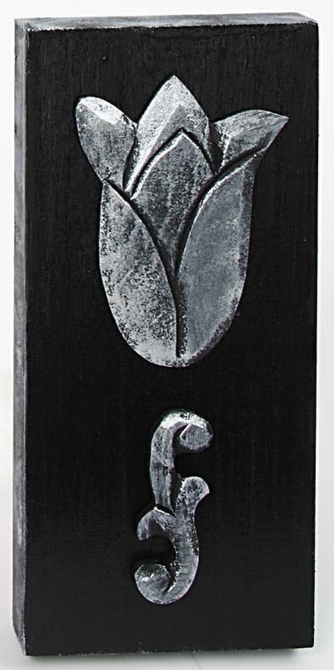 An Icon with a patinated Ornament