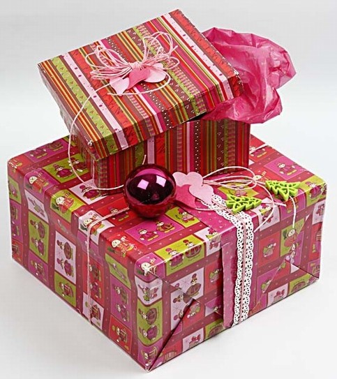 Boxes beautifully wrapped in (Helsinki) Design Paper