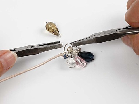 A Leather Cord Necklace with Faceted Glass Beads