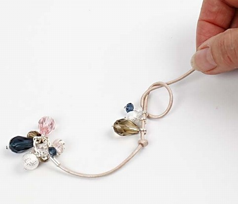 A Leather Cord Necklace with Faceted Glass Beads