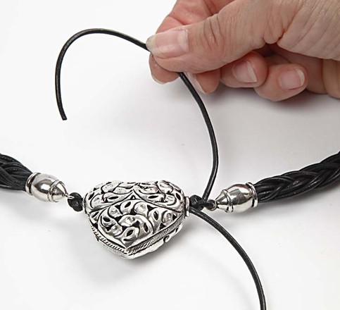 A Leather Cord Necklace with a Heart
