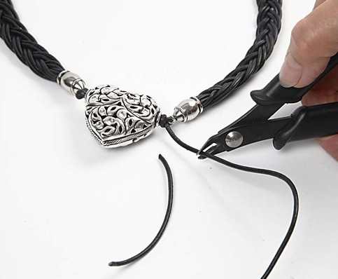 A Leather Cord Necklace with a Heart