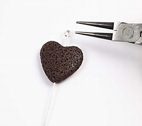 A Necklace with Lava, Silver and Leather