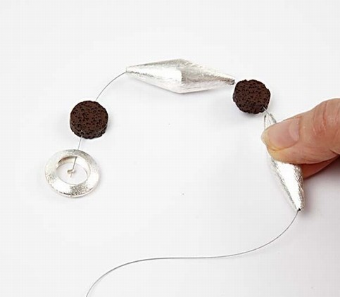 A Necklace with Lava, Silver and Leather