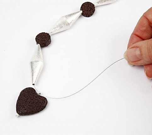A Necklace with Lava, Silver and Leather