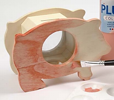 A Stained Wooden Piggy Bank