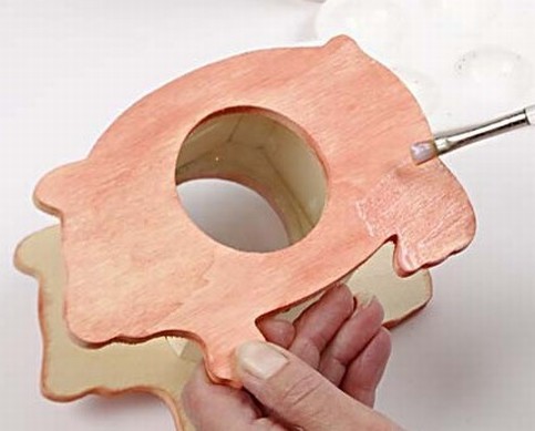 A Stained Wooden Piggy Bank