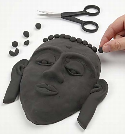 Silk Clay on a Papier-M ch Face Mask