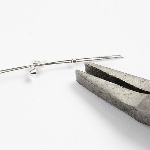A Necklace with Red Glass Beads