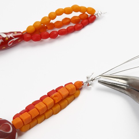 A Necklace with Red Glass Beads