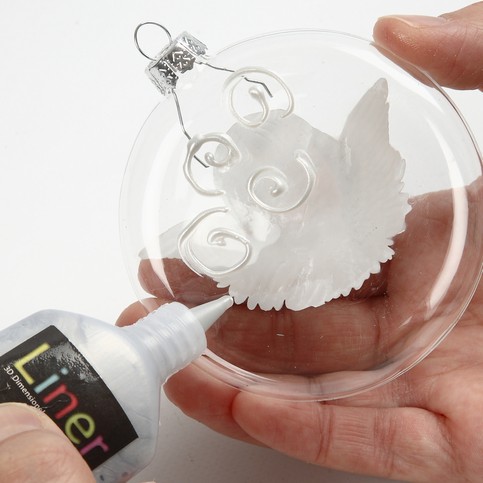 A Glass Bauble with Vintage Die-Cut