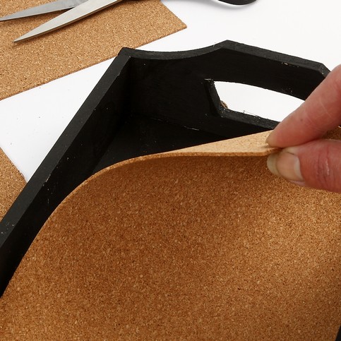 A Wooden Tray with Wooden Discs