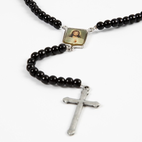 A Pendant of Christ with Wooden Beads