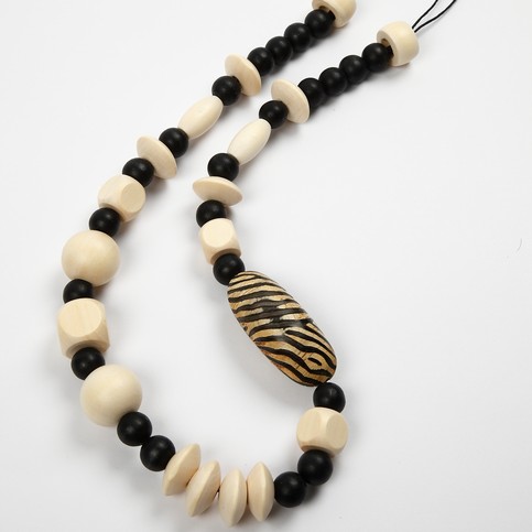A Necklace with a Buffalo Horn Bead