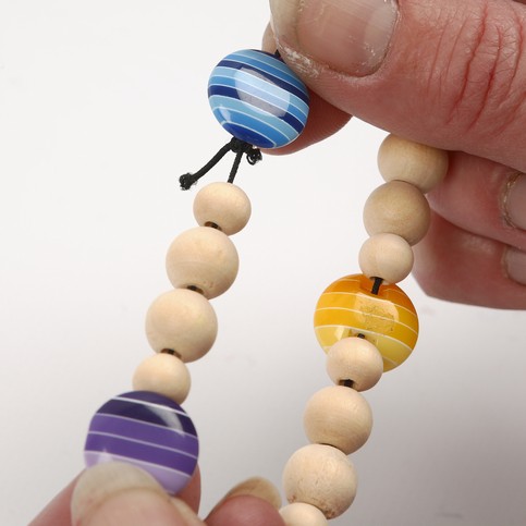 Bracelets with Wooden Beads and Plastic Buttons
