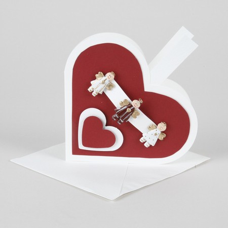 Three Christmas cards with hearts