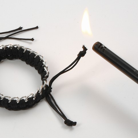 A Silicone Bracelet with Macram Cord and a Piece of Jewellery Chain