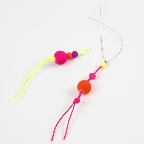A Neon-Coloured Plaited Necklace with a Fish Pendant
