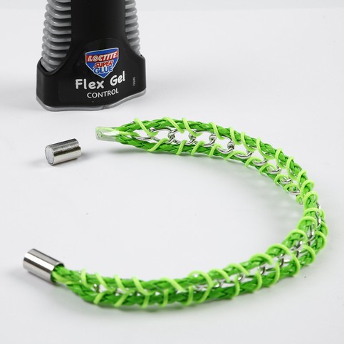 A Neon-Coloured Plaited Cord with sewn-on Piece of Jewellery Chain