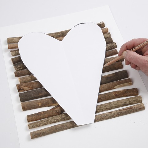 A Heart, cut out from assembled halved Tree Trunks