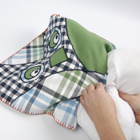 A Cuddly Animal Cushion made from Tea Towels