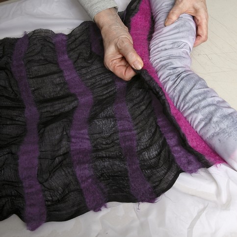 A Black Scarf with colourful Felt Stripes