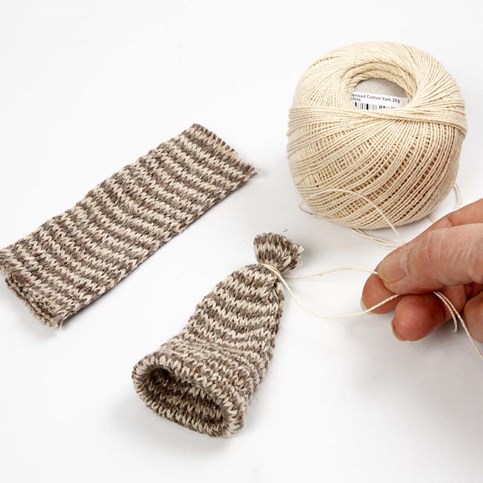Pixies made from Cones with Hats made from Knitted Tube