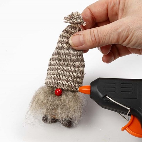 Pixies made from Cones with Hats made from Knitted Tube