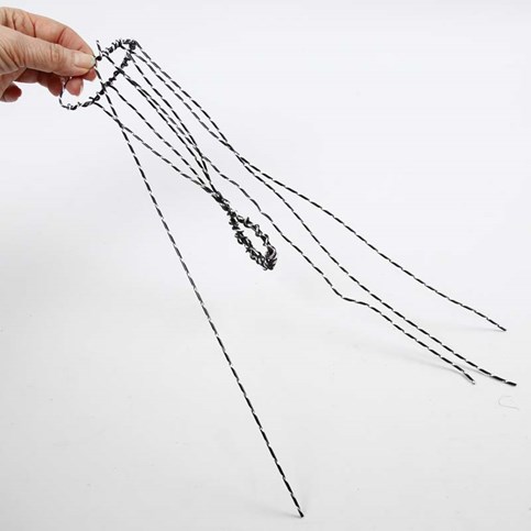 An Angel on a Stand made from black Aluminium Wire with Diamond Cut