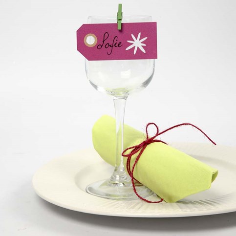 A Manilla Tag with a Punched-Out Design as a Place Card