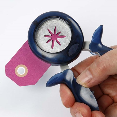 A Manilla Tag with a Punched-Out Design as a Place Card