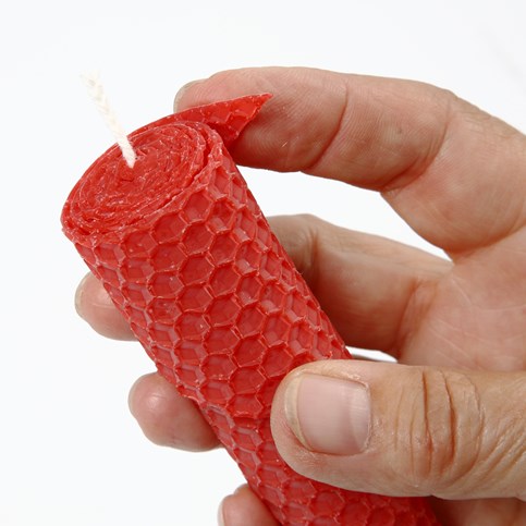 A Candle made from a rolled Sheet of Beeswax