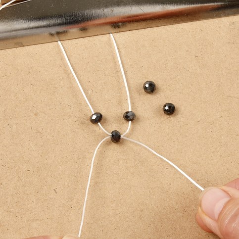 A Bracelet made from Faceted Beads – decorated with a Fashion Link