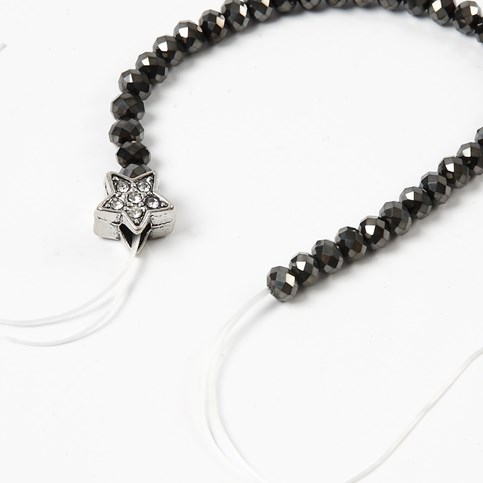 A Bracelet made from Faceted Beads – decorated with a Fashion Link