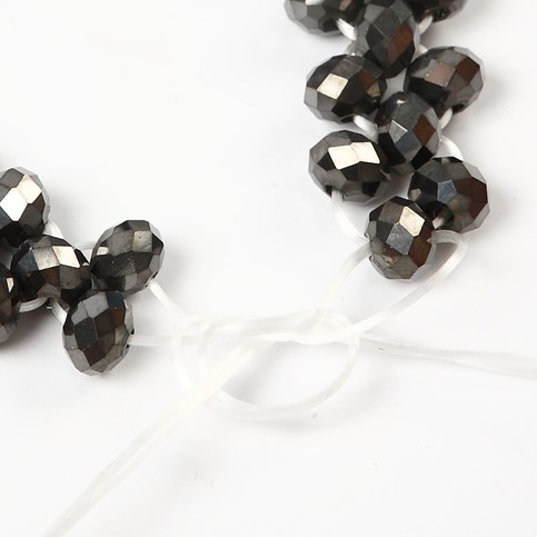 A Bracelet made from Faceted Beads – decorated with a Fashion Link