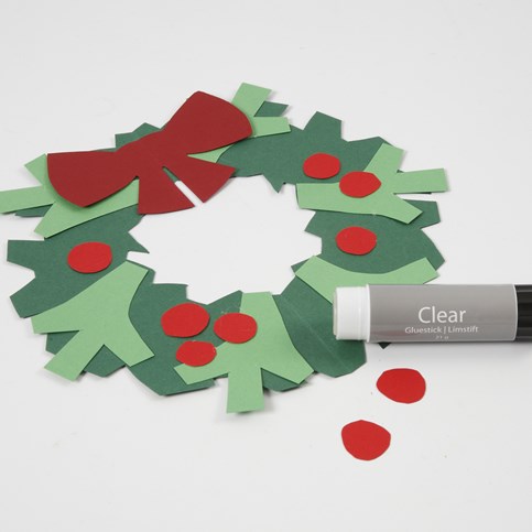 A Holly Wreath with a Bow made from Card