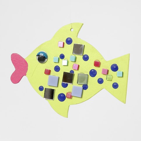 A flat wooden decorative Shape – painted and decorated with Mosaics