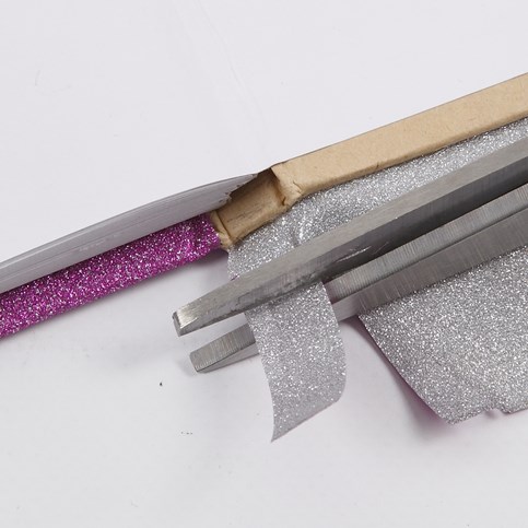 A Scrapbook made from a Notebook bound in Deco Foil