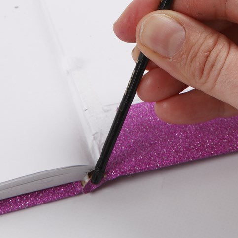 A Scrapbook made from a Notebook bound in Deco Foil