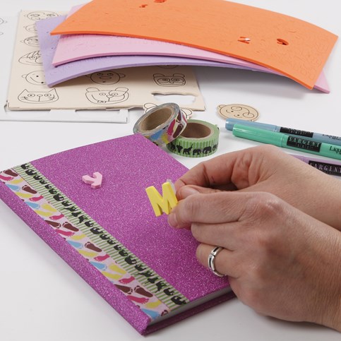A Scrapbook made from a Notebook bound in Deco Foil