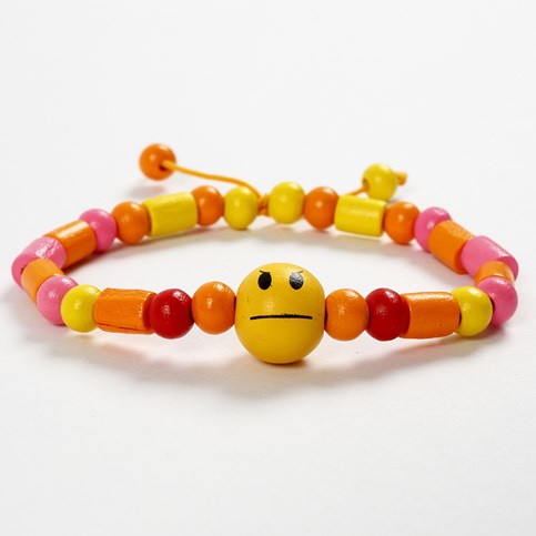 A Bracelet made from coloured Elastic Cord with a Shaped Wooden Bead and Wooden Beads