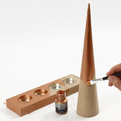 A Papier-M ch Cone Christmas Tree and a Tea Light Holder decorated with small Pieces of Wood