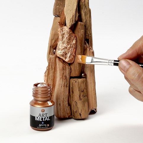 A Papier-M ch Cone Christmas Tree and a Tea Light Holder decorated with small Pieces of Wood