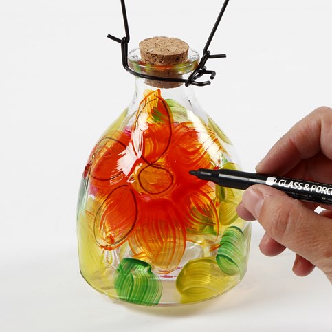 A Glass Wasp Trap decorated with a painted floral Design