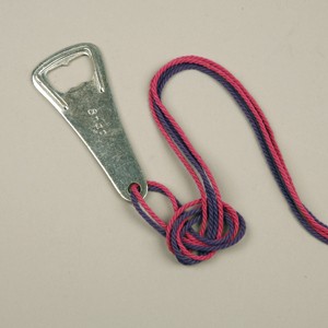 A Bottle opener with a pendant